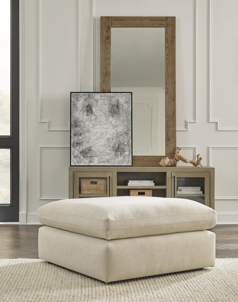 Ashley Furniture Elyza living room set featuring a sofa and matching chairs in a modern design with neutral upholstery.