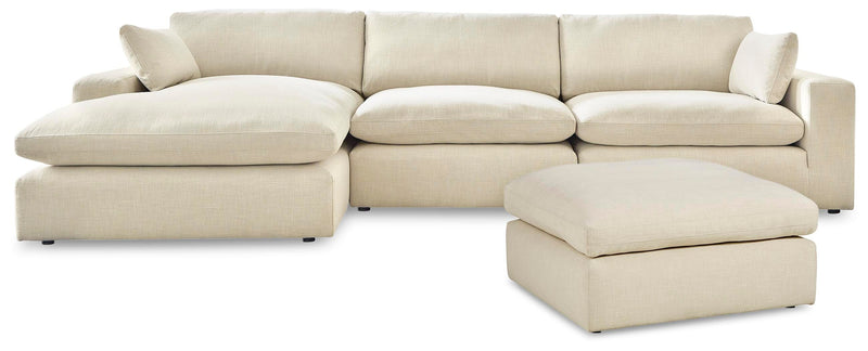 Ashley Furniture Elyza living room set with sofa and armchair in a modern design, featuring neutral fabric upholstery.