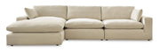 Ashley Furniture Elyza living room set with a sofa and armchair, upholstered in neutral fabric, modern design for comfortable seating.