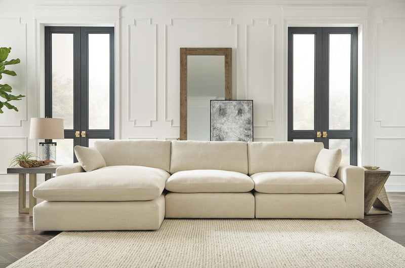 Ashley Furniture Elyza living room set featuring a sofa and loveseat with plush cushions and modern design.