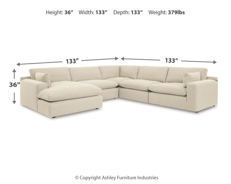 Ashley Furniture Elyza living room set featuring a modern sofa, loveseat, and armchair with plush cushions and stylish fabric upholstery.