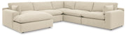 Ashley Furniture Elyza living room set with sofa and loveseat in a modern upholstery, arranged in a stylish living space.
