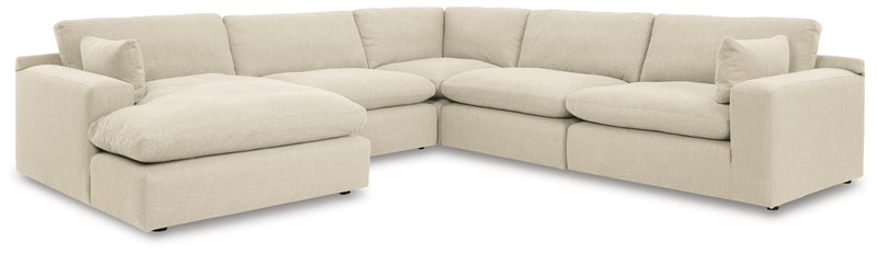 Ashley Furniture Elyza living room set with sofa and loveseat in a modern upholstery, arranged in a stylish living space.