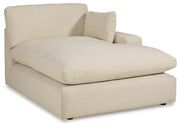 Ashley Furniture Elyza living room set featuring a sofa, loveseat, and coffee table in a modern design, viewed from an angle.