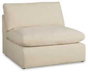 Ashley Furniture Elyza living room set with sofa, loveseat, and chair, featuring plush cushions and modern design.