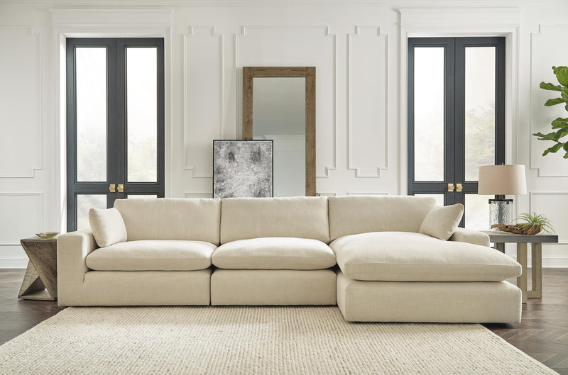 Ashley Furniture Elyza living room set with sofa, loveseat, and coffee table in a modern design.
