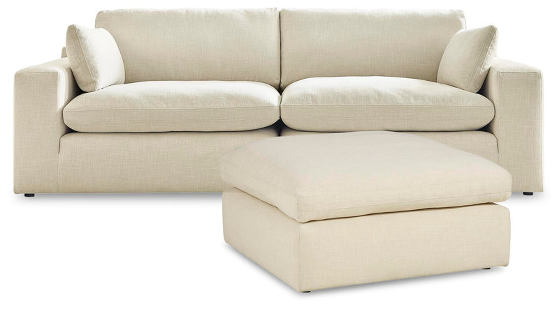 Ashley Furniture Elyza living room set featuring a sofa and loveseat with neutral upholstery and modern design.