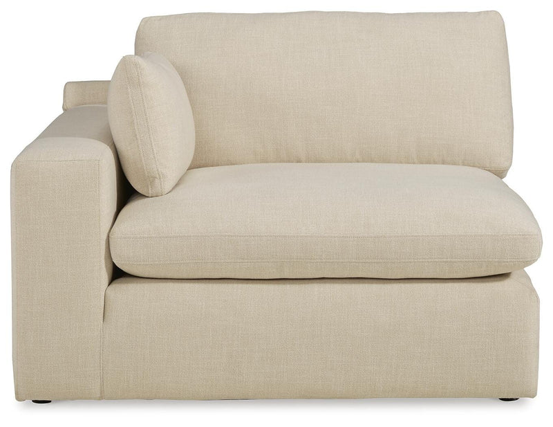 Ashley Furniture Elyza living room set with plush sofas and coordinated coffee table in a modern, stylish design.