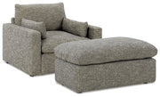 Ashley Furniture dramatic living room set with plush sofas and matching chairs, stylish and comfortable for modern living rooms.