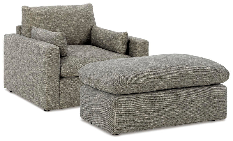 Ashley Furniture dramatic living room set with plush sofas and matching chairs, stylish and comfortable for modern living rooms.