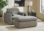 Ashley Furniture dramatic living room set with plush sofa and matching chairs, stylish and comfortable for modern living rooms.