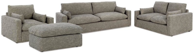 Ashley Furniture dramatic living room set featuring plush sofa and matching armchair with modern design and neutral fabric.