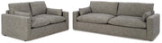 Elegant Ashley Furniture living room set with plush sofas and armchairs in a modern design, perfect for contemporary home decor.