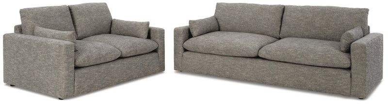 Elegant Ashley Furniture living room set with plush sofas and armchairs in a modern design, perfect for contemporary home decor.