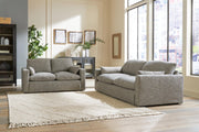 Ashley Furniture dramatic living room set with plush sofa and armchair in a stylish, modern design.