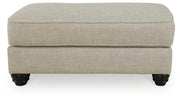 Ashley Furniture Asanti living room set featuring a sofa and matching chairs with plush cushions and stylish design.