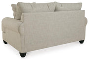 Ashley Furniture Asanti living room set with sofa and armchair, showcasing plush upholstery and elegant design.
