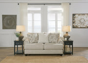 Ashley Furniture Asanti loveseat with plush upholstery and stylish design, perfect for a cozy living space.