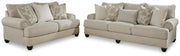 Ashley Furniture Asanti Living Room Set with sofa and armchair in a modern design, featuring soft upholstery and stylish cushions.