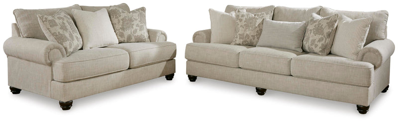 Ashley Furniture Asanti Living Room Set with sofa and armchair in a modern design, featuring soft upholstery and stylish cushions.