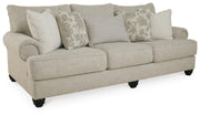 Ashley Furniture Asanti living room set featuring a sofa, loveseat, and armchair arranged in a modern style.