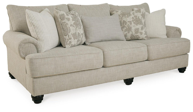 Ashley Furniture Asanti living room set featuring a sofa, loveseat, and armchair arranged in a modern style.