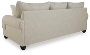 Ashley Furniture Asanti living room set with sofa and armchair, showcasing plush upholstery and modern design.