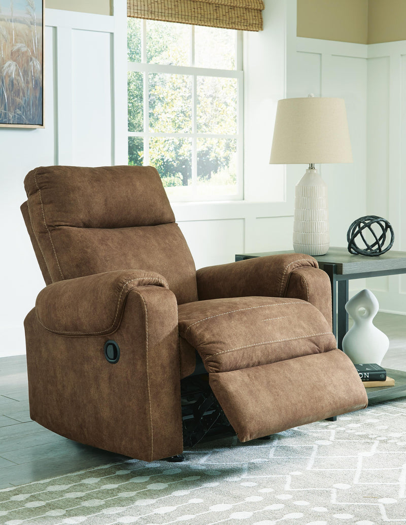 Open Edenwold recliner by Ashley Furniture showing plush fabric upholstery and padded armrests in a modern living room setting.