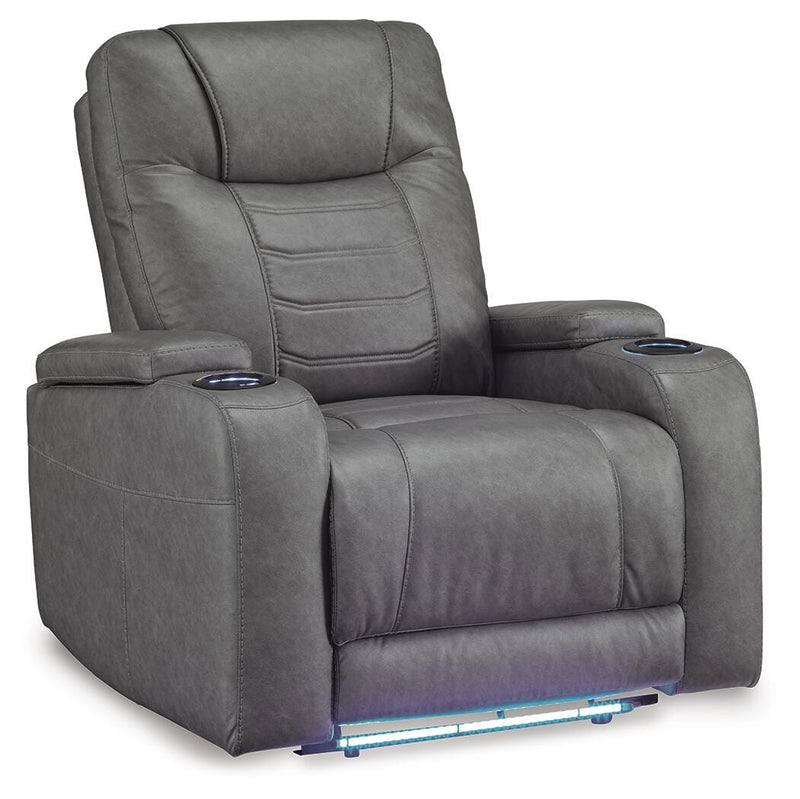 Ashley Furniture Schooner Rocks Power Recliner with plush cushioning and dark wood finish, shown from an angled closed position.