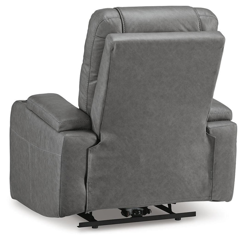 Ashley Furniture Schooner Rocks power recliner with plush upholstery and adjustable backrest, shown from the back.