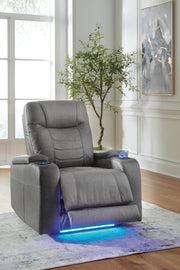 Open Schooner Rocks Power Recliner by Ashley Furniture showing plush upholstery and adjustable reclining mechanism.