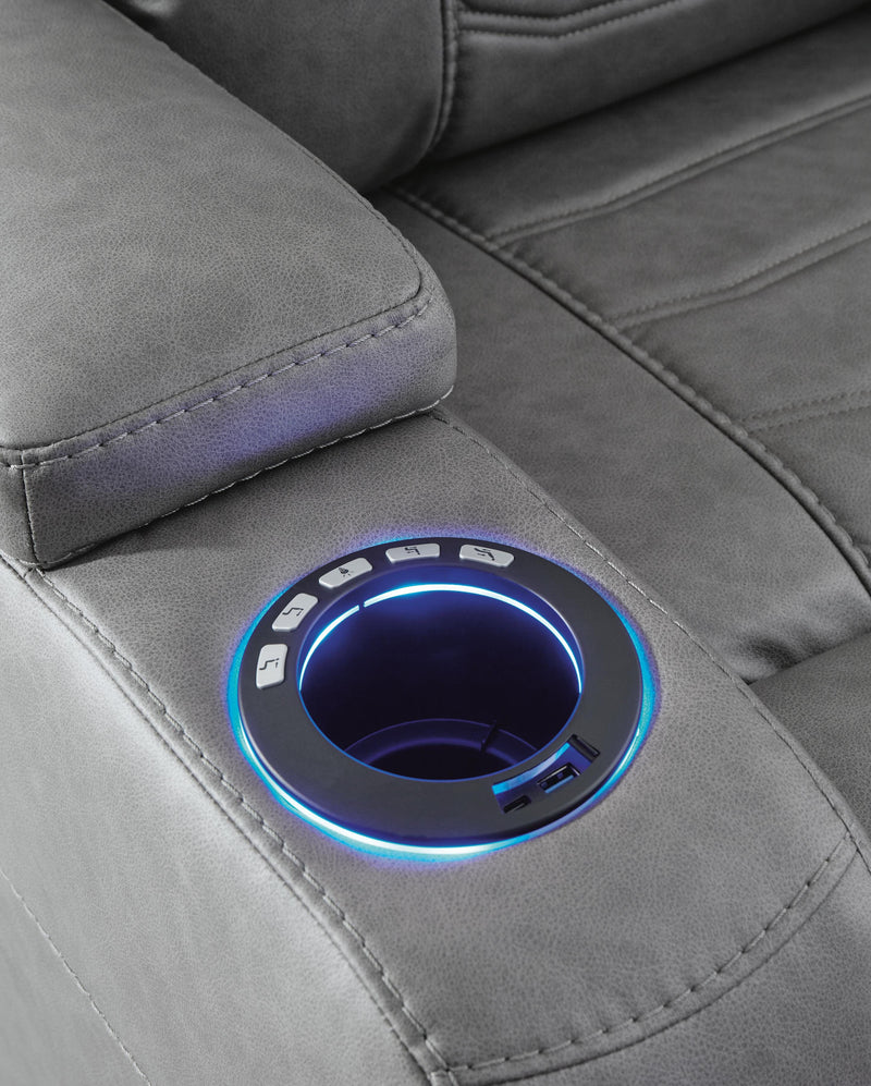 Ashley Furniture Schooner Rocks power recliner with USB port, upholstered in plush fabric, featuring a comfortable, modern design.