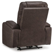 Ashley Furniture Schooner Rocks power recliner with plush upholstery and built-in recline mechanism, shown from the back in the image.