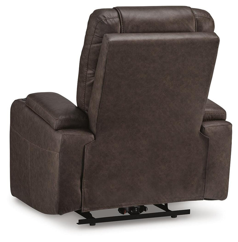 Ashley Furniture Schooner Rocks power recliner with plush upholstery and built-in recline mechanism, shown from the back in the image.