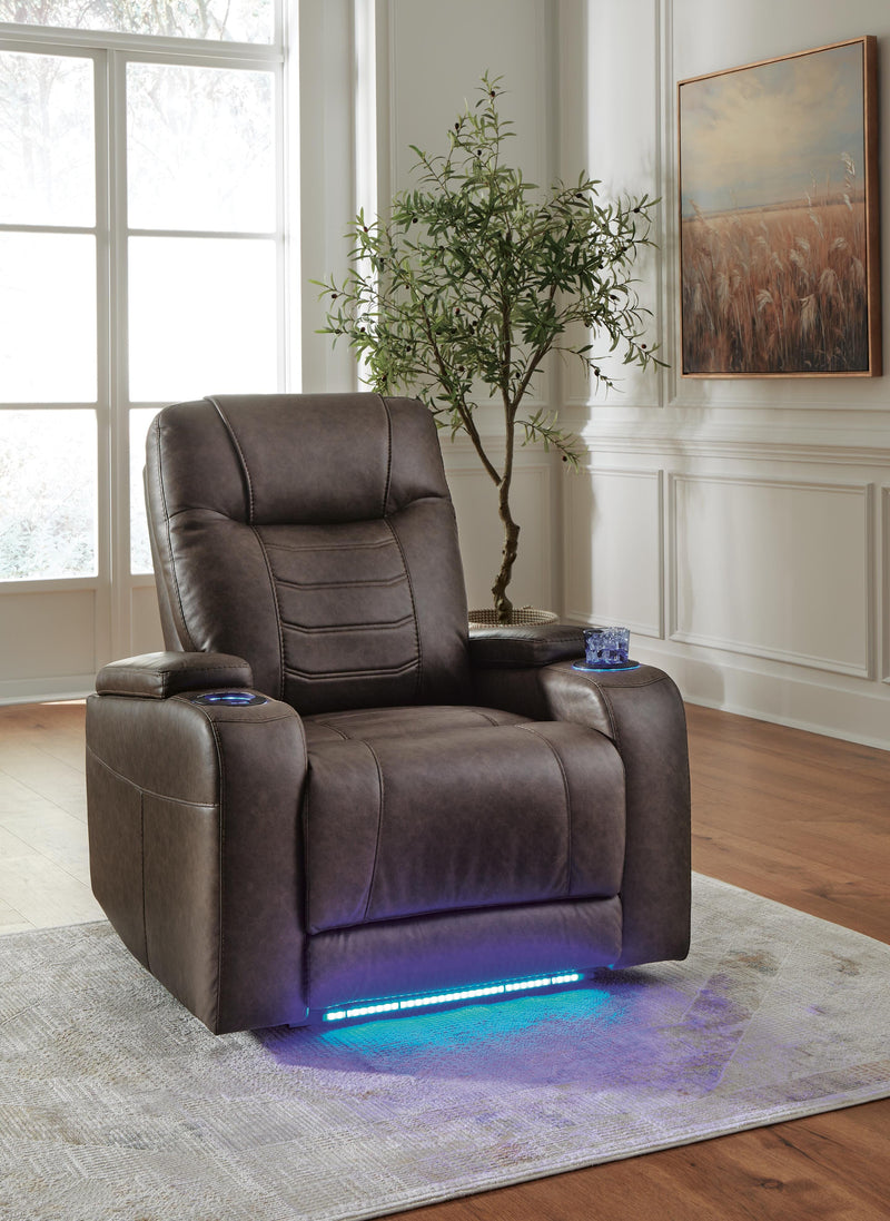 Ashley Furniture Schooner Rocks power recliner with plush upholstery and built-in recline mechanism, shown in closed position.