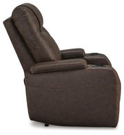 Ashley Furniture Schooner Rocks Power Recliner with plush fabric and side control panel, featuring a comfortable recline and modern design.