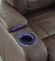 Ashley Furniture Schooner Rocks Power Recliner with USB port, featuring plush upholstery and ergonomic design for comfort.