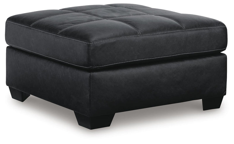 Ashley Furniture Barlin Mills oversized accent ottoman with plush fabric and modern design, shown from an angled view.