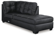 Ashley Furniture Barlin Mills sectional with chaise, showing a stylish fabric sofa with a chaise lounge in a contemporary living room.