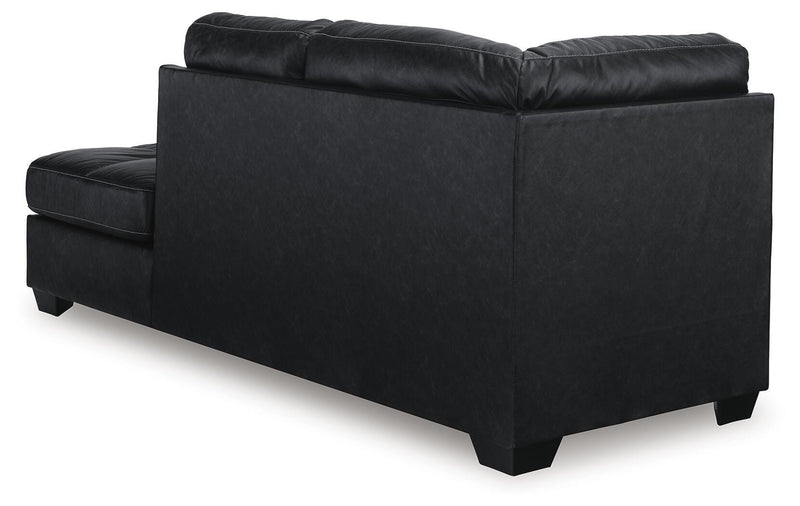 Ashley Furniture Barlin Mills sectional with chaise, featuring plush upholstery and modern design, shown from the back view.