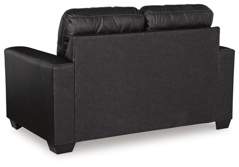 Ashley Furniture Barlin Mills loveseat with plush fabric and cushioned back, shown from the back view.