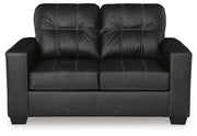 Ashley Furniture Barlin Mills living room set with plush sofa, armchair, and coordinating coffee table in a modern design.