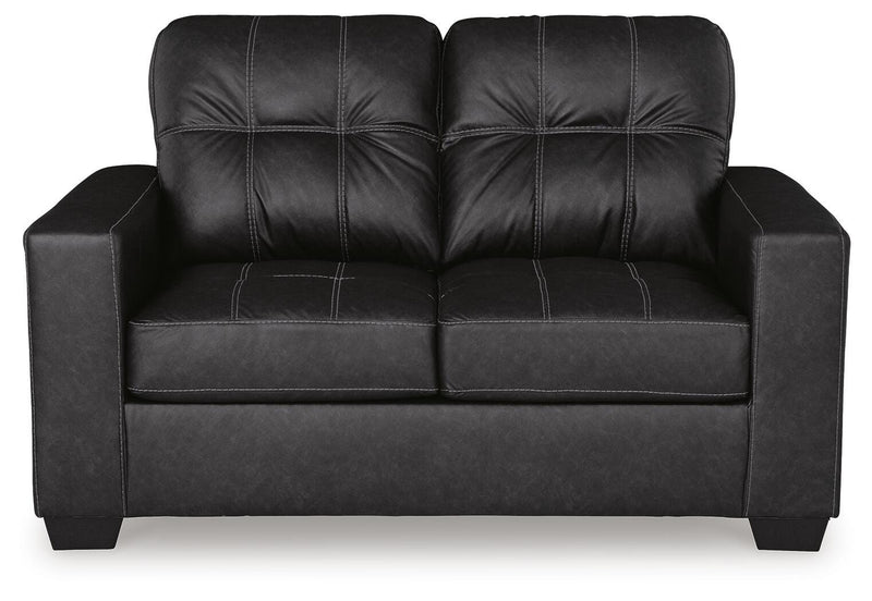 Ashley Furniture Barlin Mills living room set with plush sofa, armchair, and coordinating coffee table in a modern design.