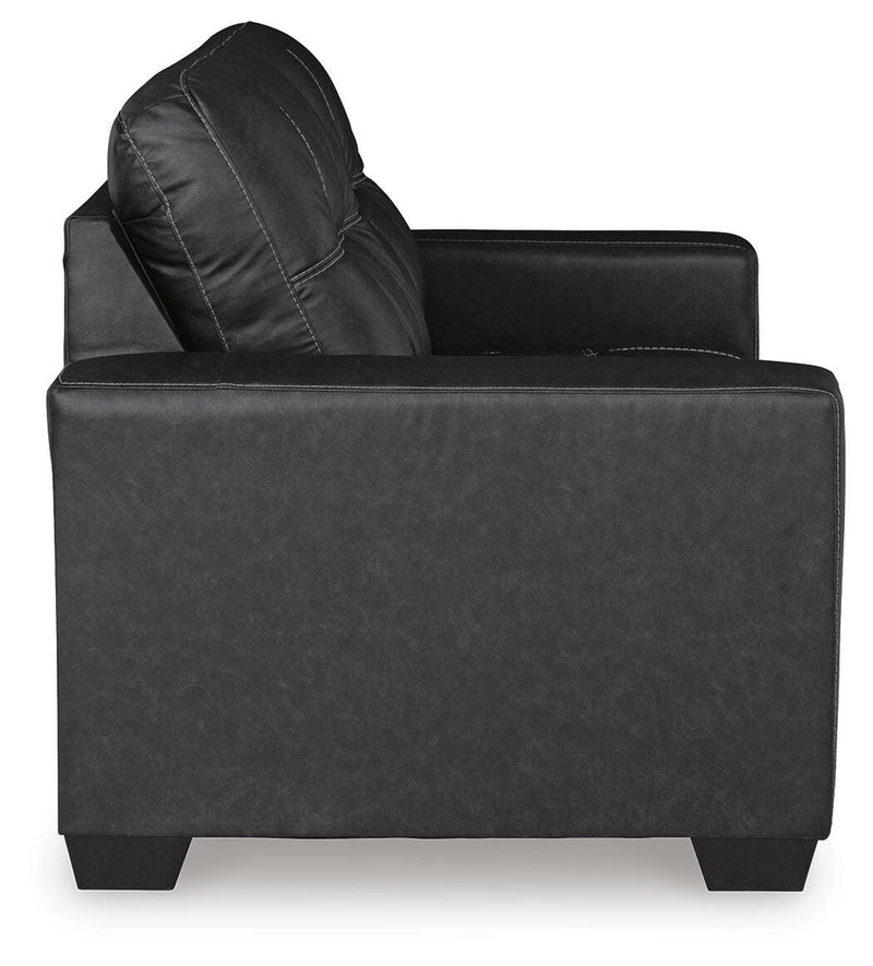 Ashley Furniture Barlin Mills loveseat with plush fabric and cushioned armrests, shown in a cozy living room setting.