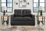 Ashley Furniture Barlin Mills loveseat with plush fabric and cushioned arms, perfect for cozy living room seating.