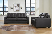 Ashley Furniture Barlin Mills living room set featuring a sofa and matching armchair in a modern design.