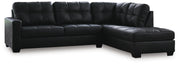 Ashley Furniture Barlin Mills sectional with chaise, showcasing plush fabric upholstery and modern design in a spacious living room setting.