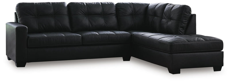 Ashley Furniture Barlin Mills sectional with chaise, showcasing plush fabric upholstery and modern design in a spacious living room setting.