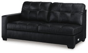 Ashley Furniture Barlin Mills sectional with chaise, showing a modern fabric sofa with a spacious chaise lounge and angled view.