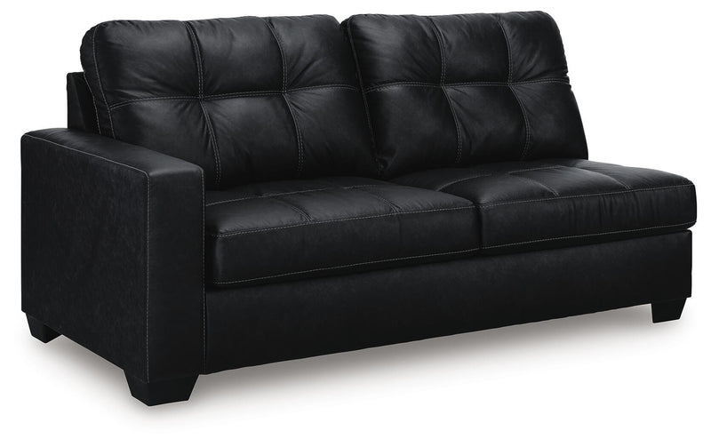 Ashley Furniture Barlin Mills sectional with chaise, showing a stylish fabric sofa with a chaise lounge in a modern living room setting.